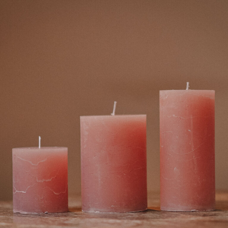 Powder pink cylinder candle