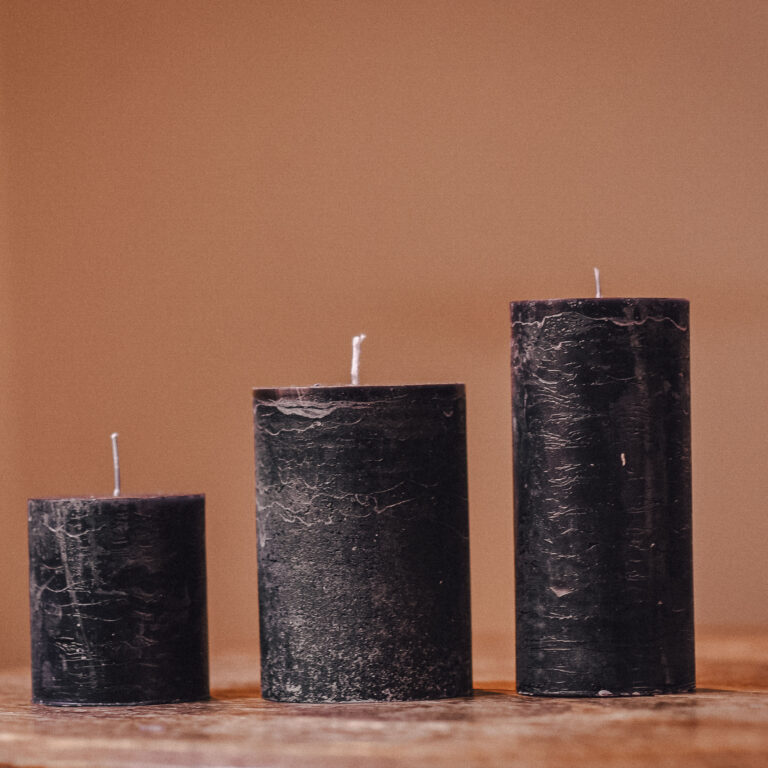 Black cylinder candle