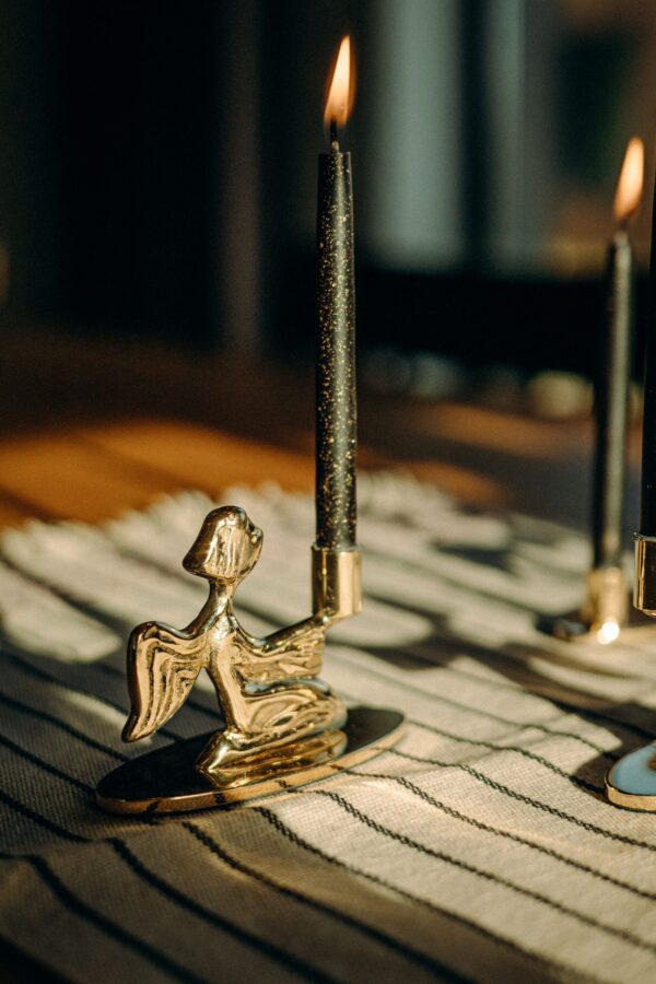 Brass candlestick - Angel. The one that sits